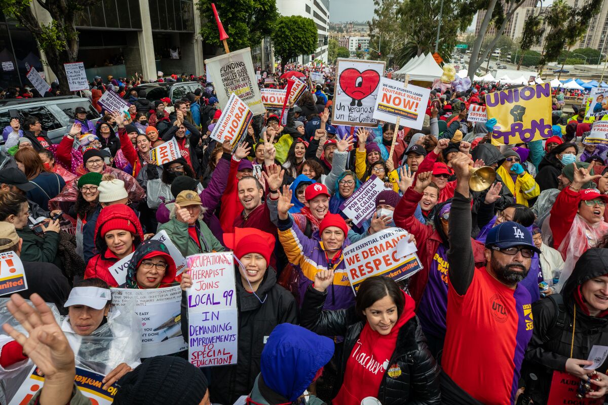 Employees rally Tuesday in front of LAUSD headquarter at the start of a three-day strike.