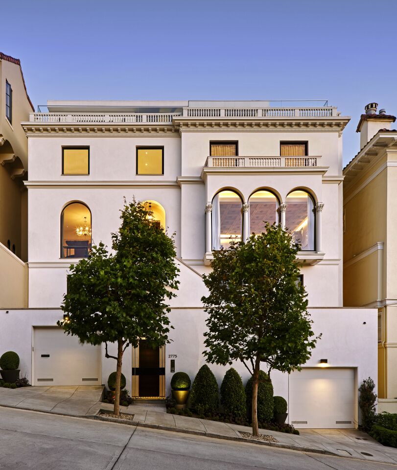 The exterior of an Italian Renaissance-style home on a sloped street in San Francisco's Pacific Heights