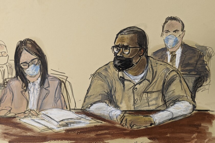     Drawing of a masked man sitting in court with his lawyer.