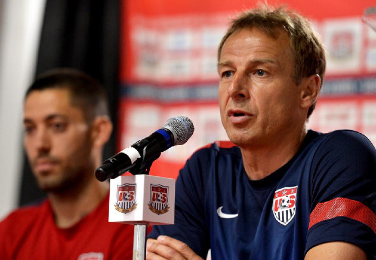 U.S. Coach Juergen Klinsmann, right, speaks during a press conference earlier this month.