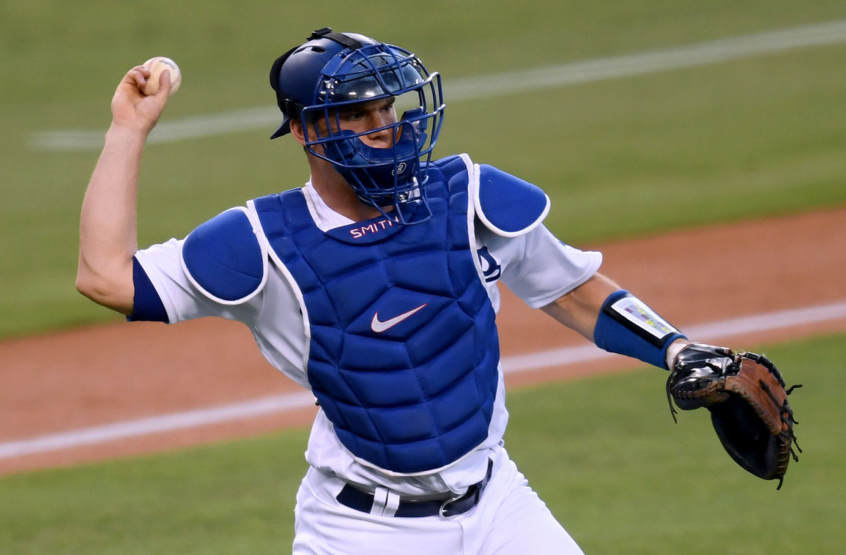 Dodgers catcher Will Smith throws during a game against the Padres.