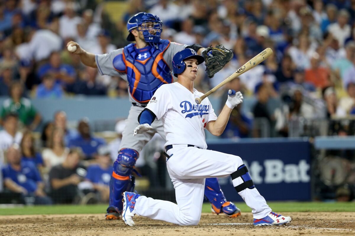 Dodgers outfielder Joc Pederson reacts after striking out against the New York Mets in the playoffs.