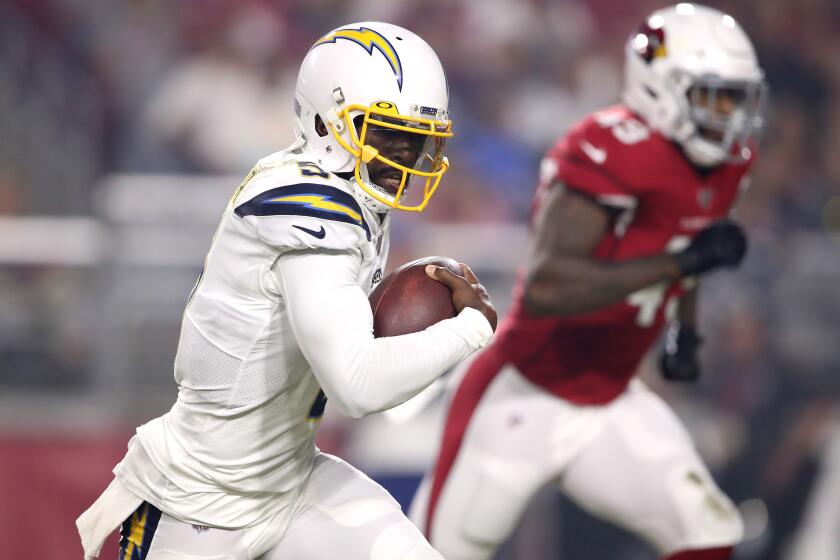 GLENDALE, ARIZONA - AUGUST 08: Tyrod Taylor #5 of the Los Angeles Chargers runs with the ball during a preseason game against the Arizona Cardinals at State Farm Stadium on August 08, 2019 in Glendale, Arizona. (Photo by Christian Petersen/Getty Images) ** OUTS - ELSENT, FPG, CM - OUTS * NM, PH, VA if sourced by CT, LA or MoD **