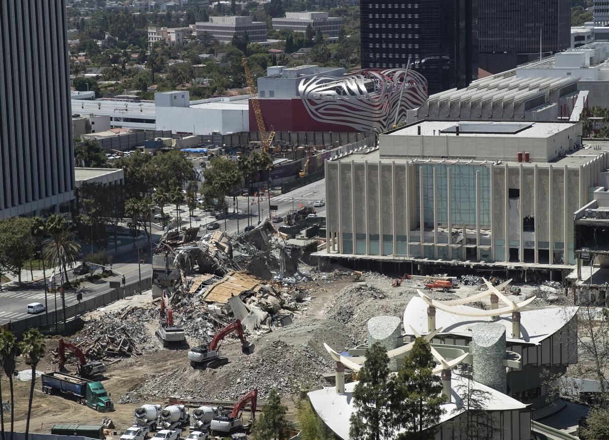 An aerial view shows buildings in the LACMA campus being demolished.
