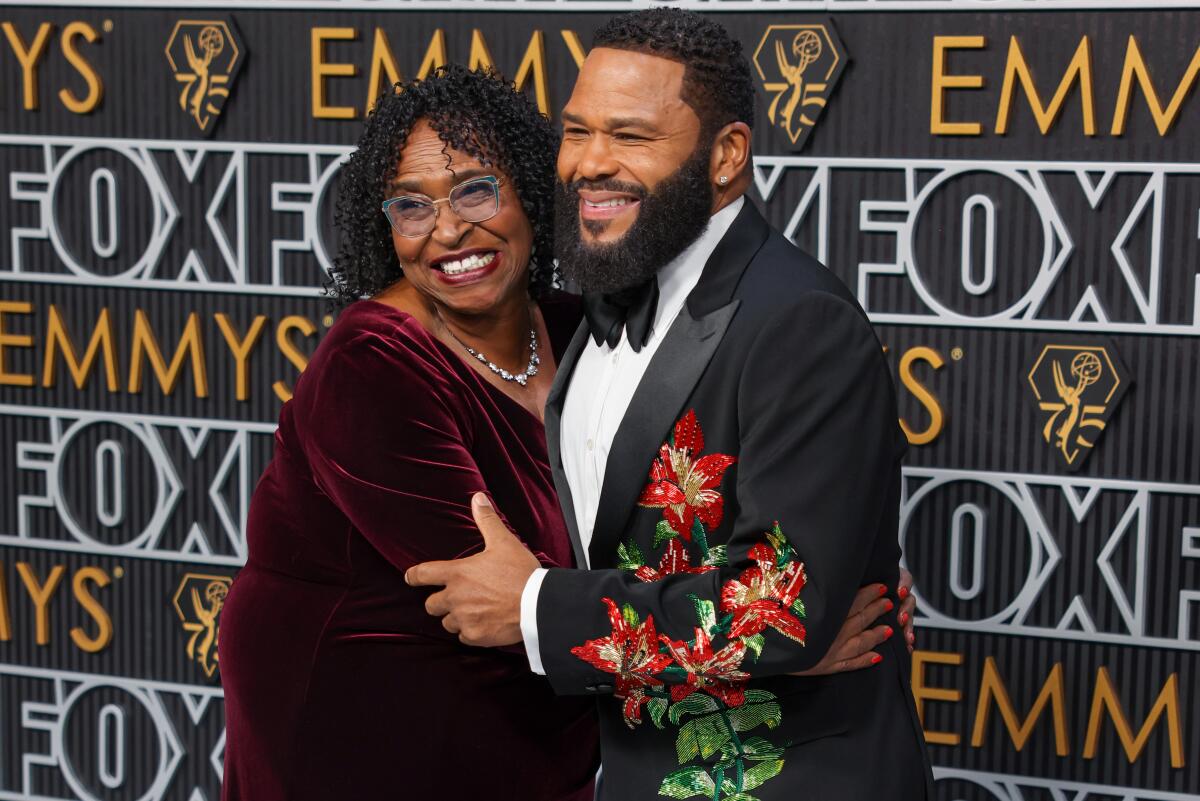 Anthony Anderson and his mother, Doris Hancox, arrive at the 75th Emmy Awards.