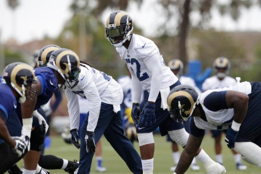 Middle linebacker Alec Ogletree lines up with the first-team defense during organized team activities on June 1.