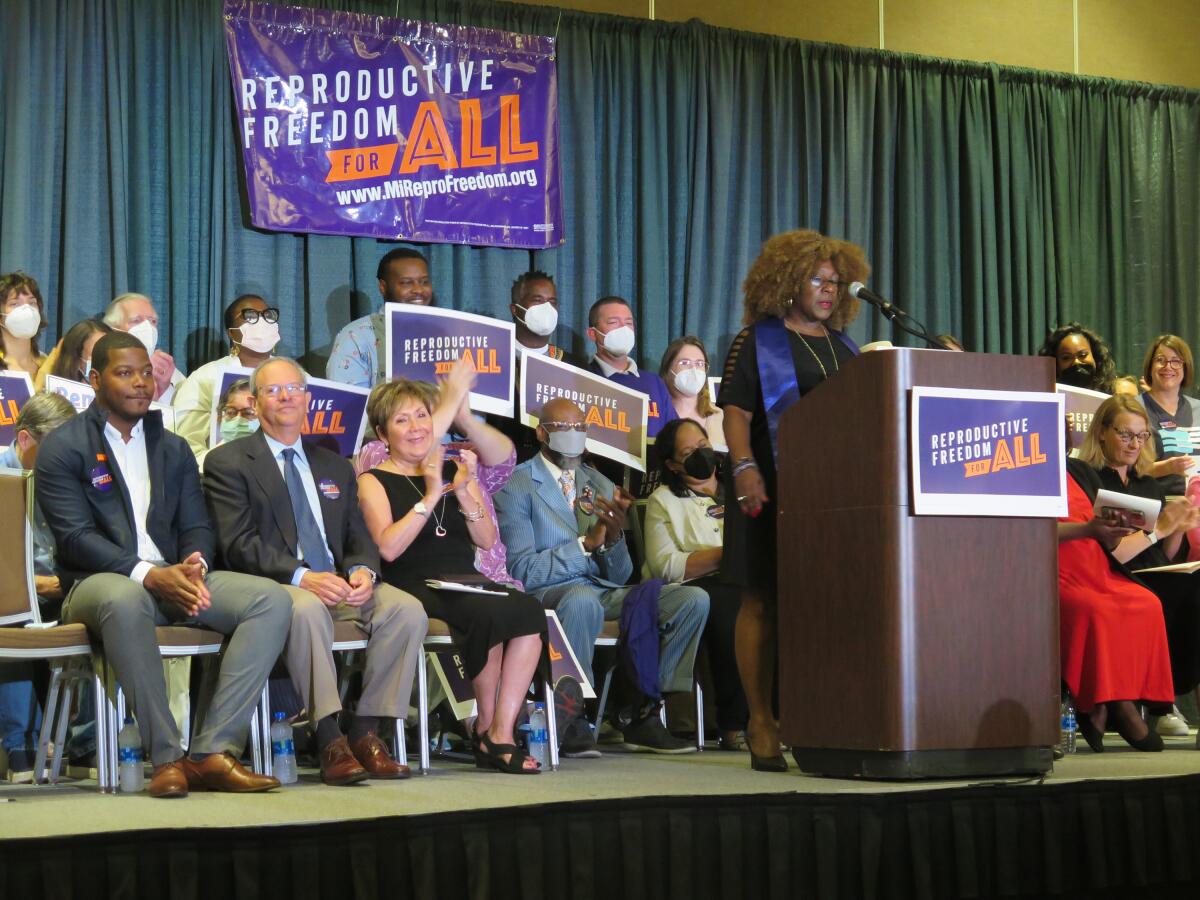 Supporters of abortion rights in Michigan on a stage