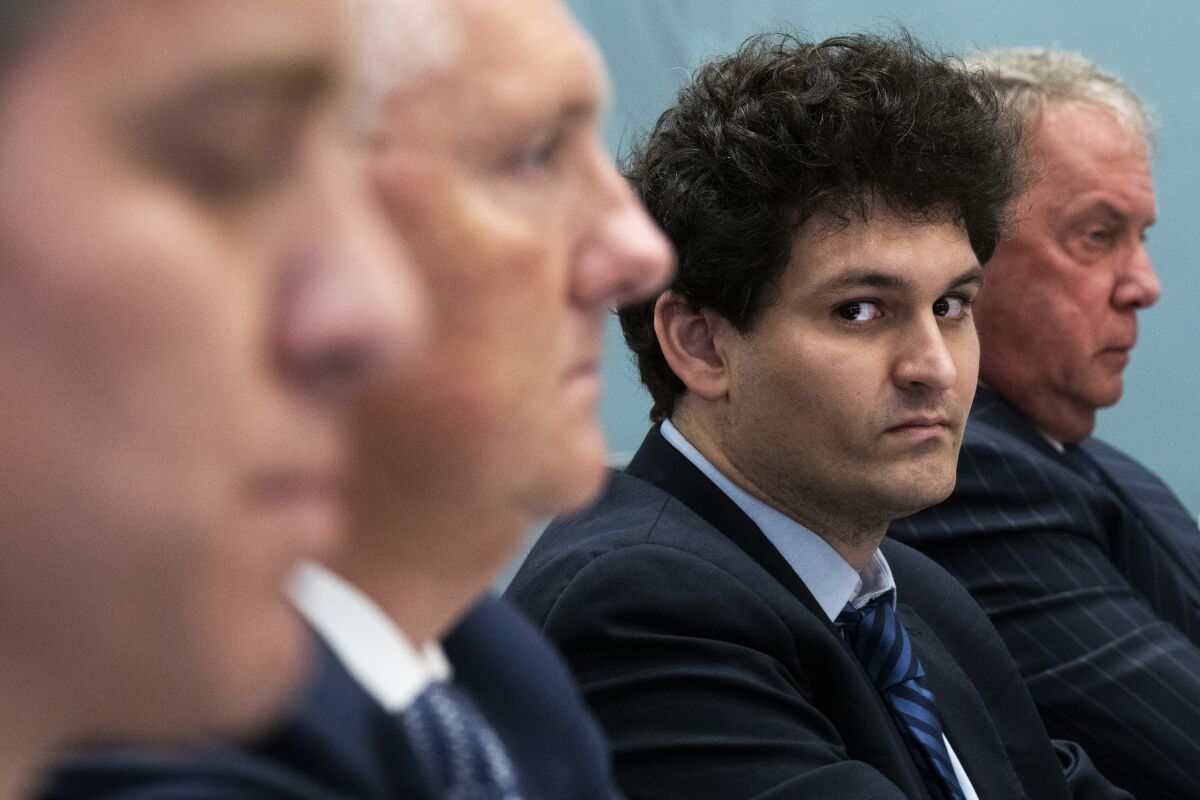 Sam Bankman-Fried sits in a House hearing.