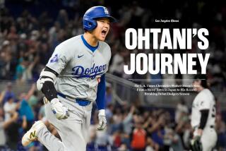 A book cover features of a photo of Shohei Ohtani smiling and running on the baseball path 