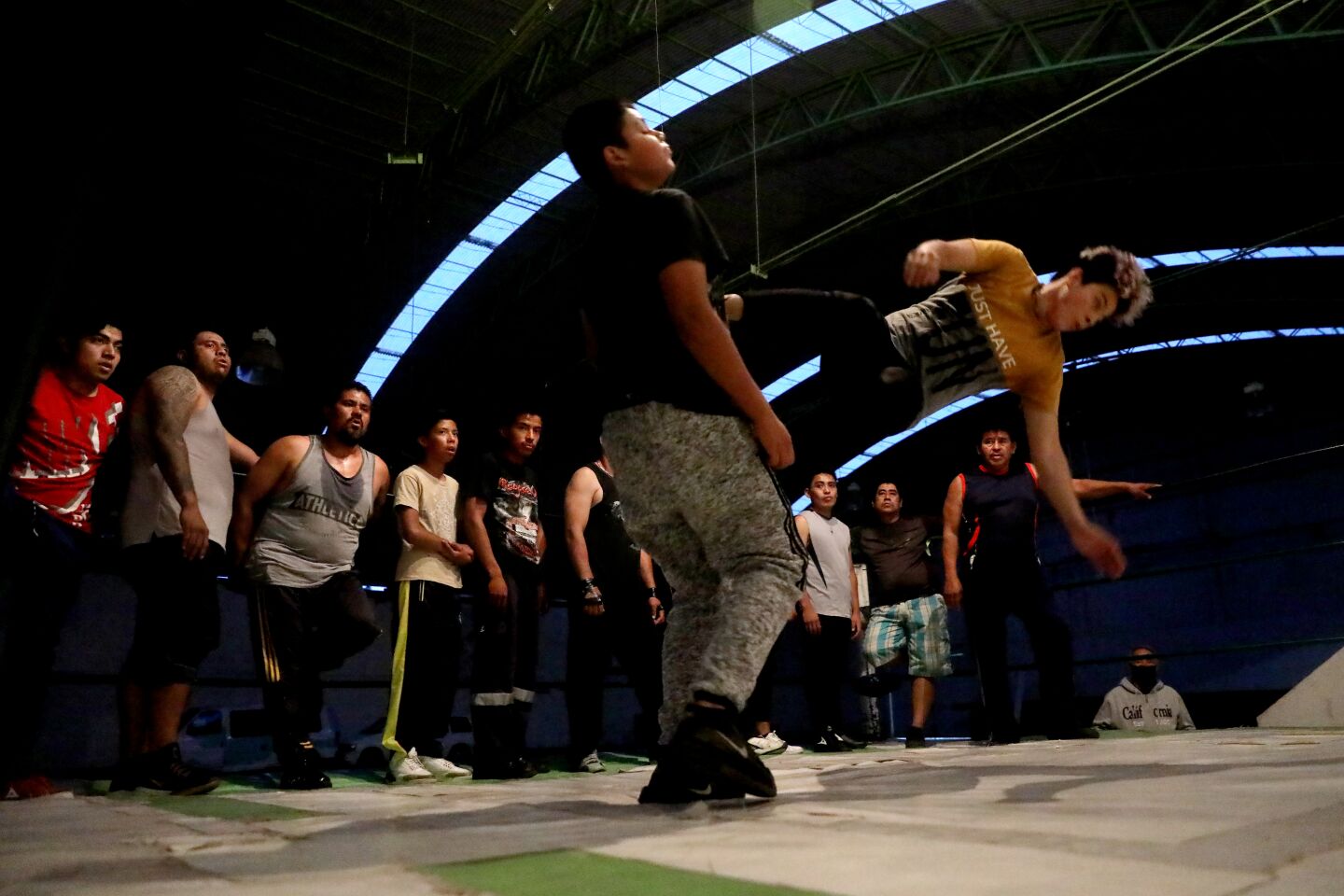 Wrestlers train at the Centro Civico in Ecatepec, Mexico, on Aug. 17.