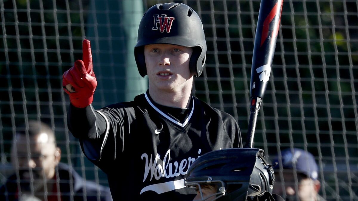 Harvard-Westlake outfielder Pete Crow-Armstrong bats against Birmingham during a game Feb. 19, 2019.   