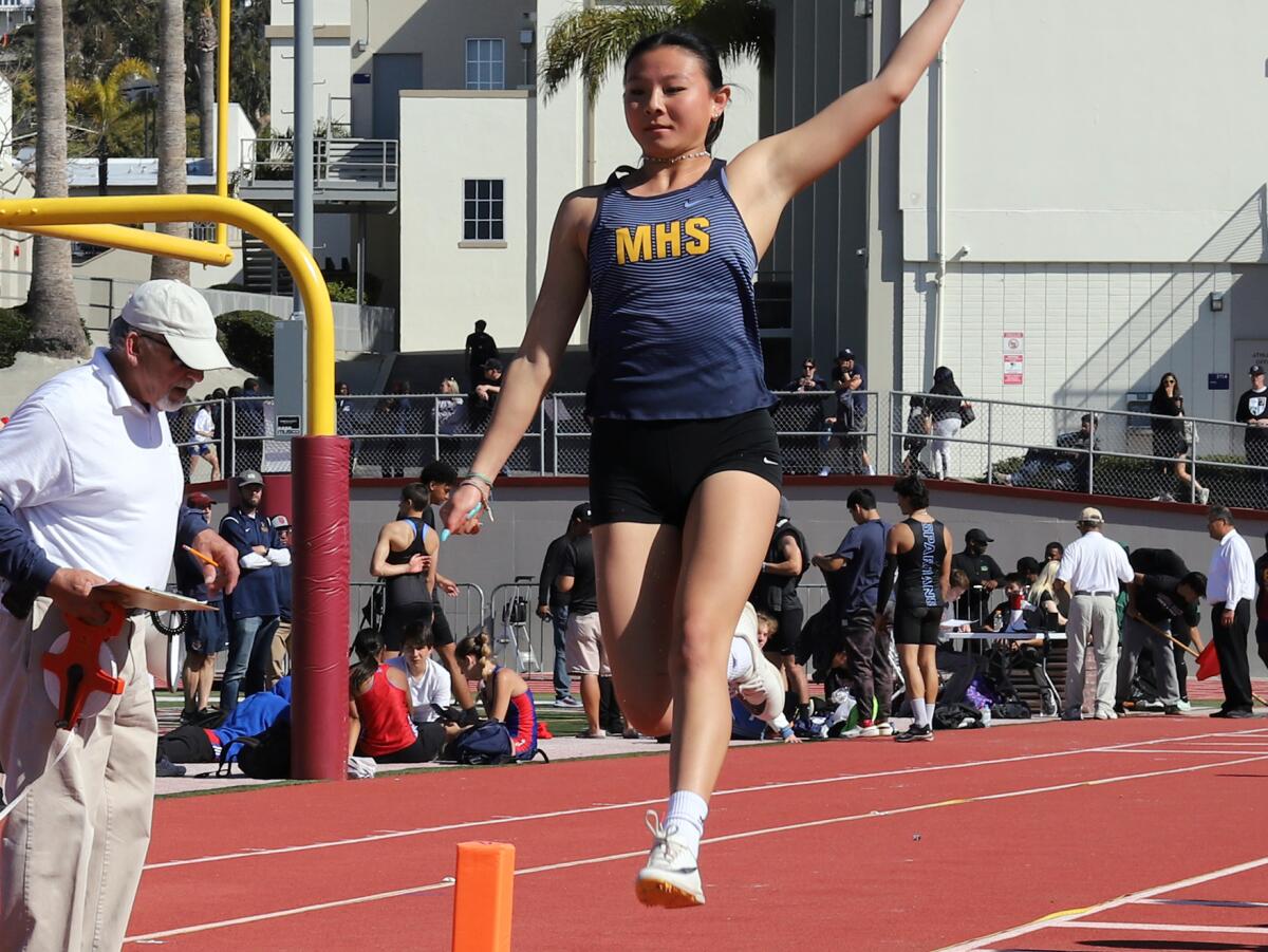 Marina's Julia Wang competes in the girls' long jump during the Laguna Beach Trophy Invitational on Saturday.