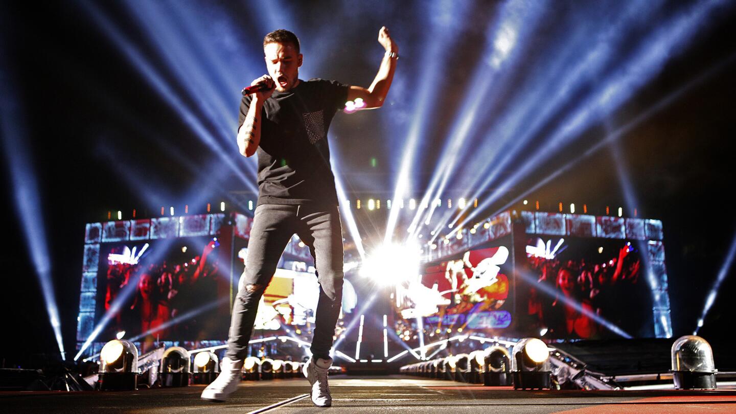 Liam Payne of One Direction performs during the U.K. boy band's Where We Are tour stop at the Rose Bowl on Thursday.