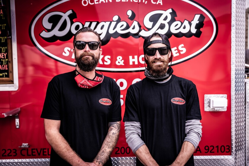 Scott Breshears (left) and Kelin Jones own Dougie’s Best Steaks & Hoagies in Ocean Beach.