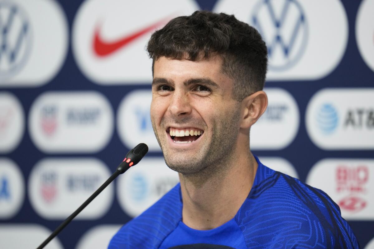 Christian Pulisic of the United States smiles during a news conference
