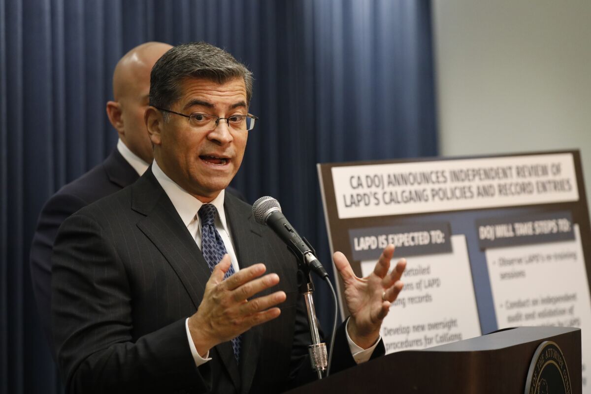 California Atty. Gen. Xavier Becerra speaks at a news conference earlier this year.