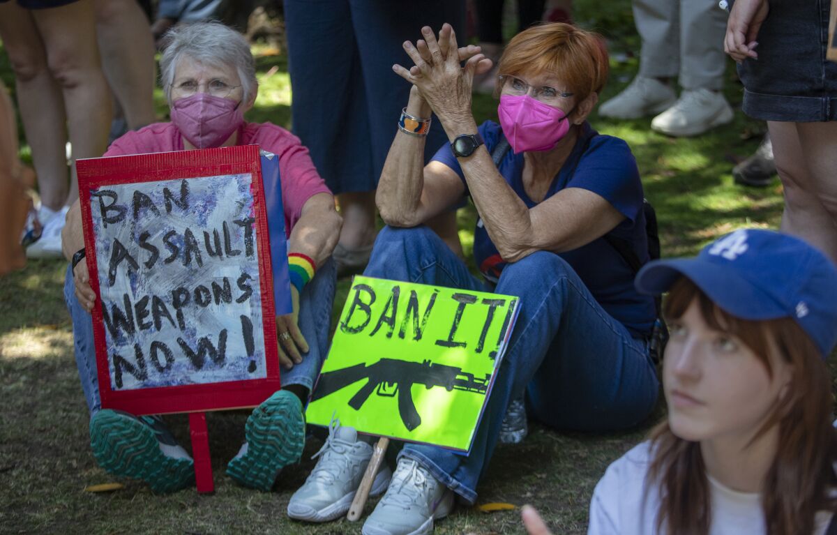 Participants listen to speakers during the March for our Lives against gun violence in downtown Los Angeles on June 11.