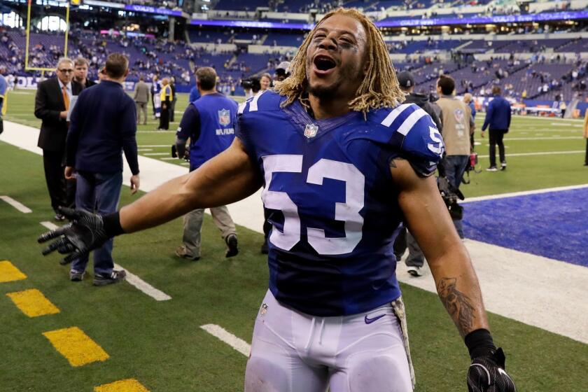 FILE - In this Nov. 20, 2016 file photo, Indianapolis Colts linebacker Edwin Jackson (53) walks off the field following an NFL football game against the Tennessee Titans in Indianapolis. Jackson, 26, was one of two men killed when a suspected drunken driver struck them as they stood outside their car along a highway in Indianapolis. The Colts said in a statement Sunday, Feb. 4, 3018, that the team is "heartbroken" by Jackson's death. Authorities say the driver that struck them before dawn on Sunday tried to flee on foot but was quickly captured. (AP Photo/Darron Cummings, File)