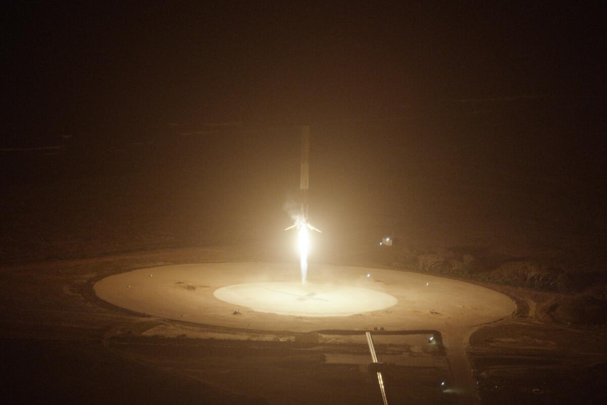 A handout photo from SpaceX shows the Hawthorne-based company's Falcon 9 rocket successfully landing upright at Cape Canaveral Air Force Station in Florida.