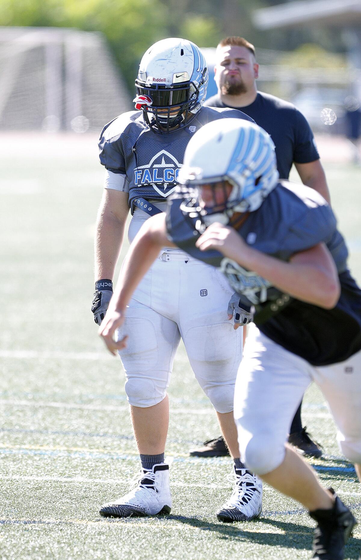 Crescenta Valley offensive lineman Armen Erdoglyan, who was pulled out of the hitting drills for part of the practice, at a preseason football practice at Crescenta Valley High School on Thursday, August 15, 2019.