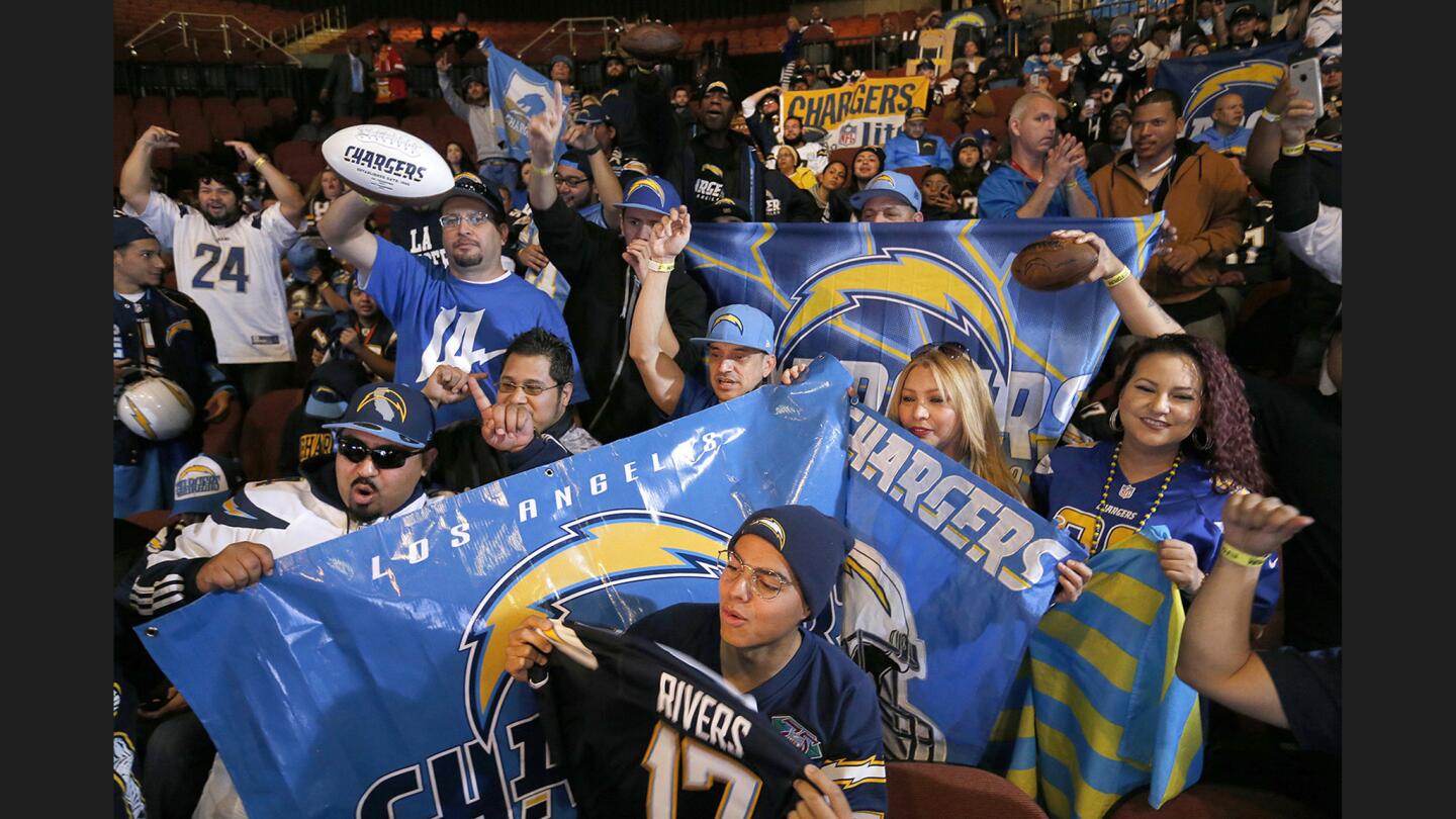 Fans rally during a ceremony to kick off the Chargers' return to Los Angeles at The Forum in Inglewood on Jan. 18.