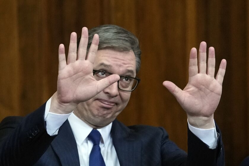 Serbia's President Aleksandar Vucic gestures during a special session of Serbia's parliament about the negotiations' process with Kosovo in Belgrade, Serbia, Thursday, Feb. 2, 2023. Serbia fought a 1998-99 war with ethnic Albanian separatists in Kosovo, which at the time was a Serbian province. A NATO intervention that forced Serbia to pull out of the territory ended the war, but tensions over Kosovo's status remains a source of instability in the Balkans. (AP Photo/Darko Vojinovic)