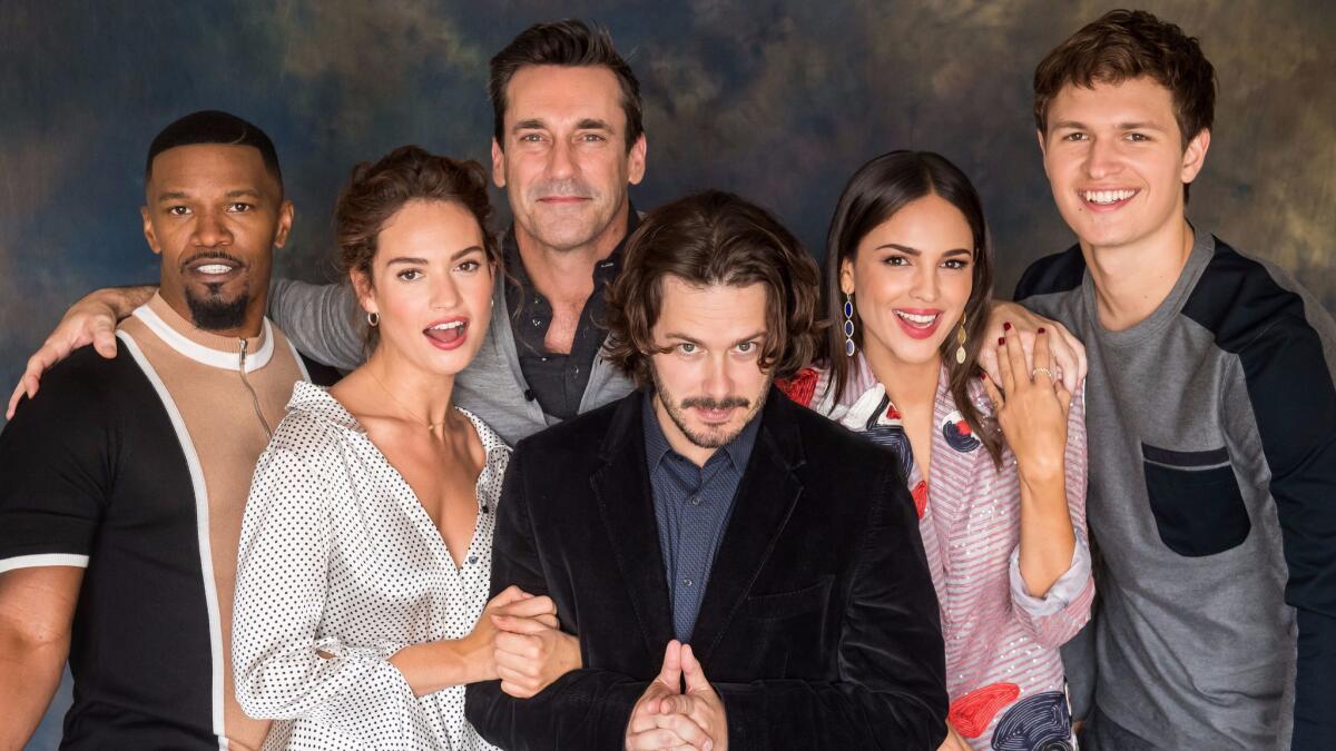 Director Edgar Wright, center, and his "Baby Driver" cast: from left, Jamie Foxx, Lily James, Jon Hamm, Eiza Gonzalez and Ansel Elgort.