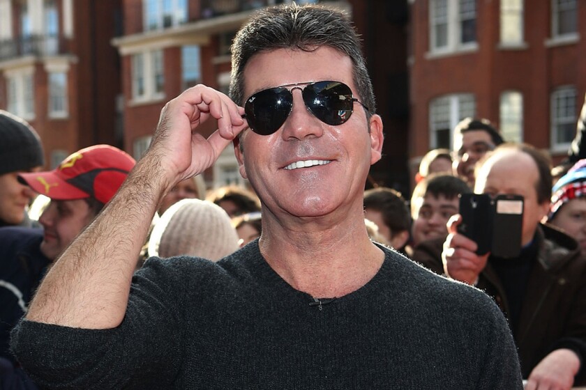 LONDON, ENGLAND - FEBRUARY 13: Simon Cowell, shown in London in February, welcomed a baby son Friday with Lauren Silverman in New York.