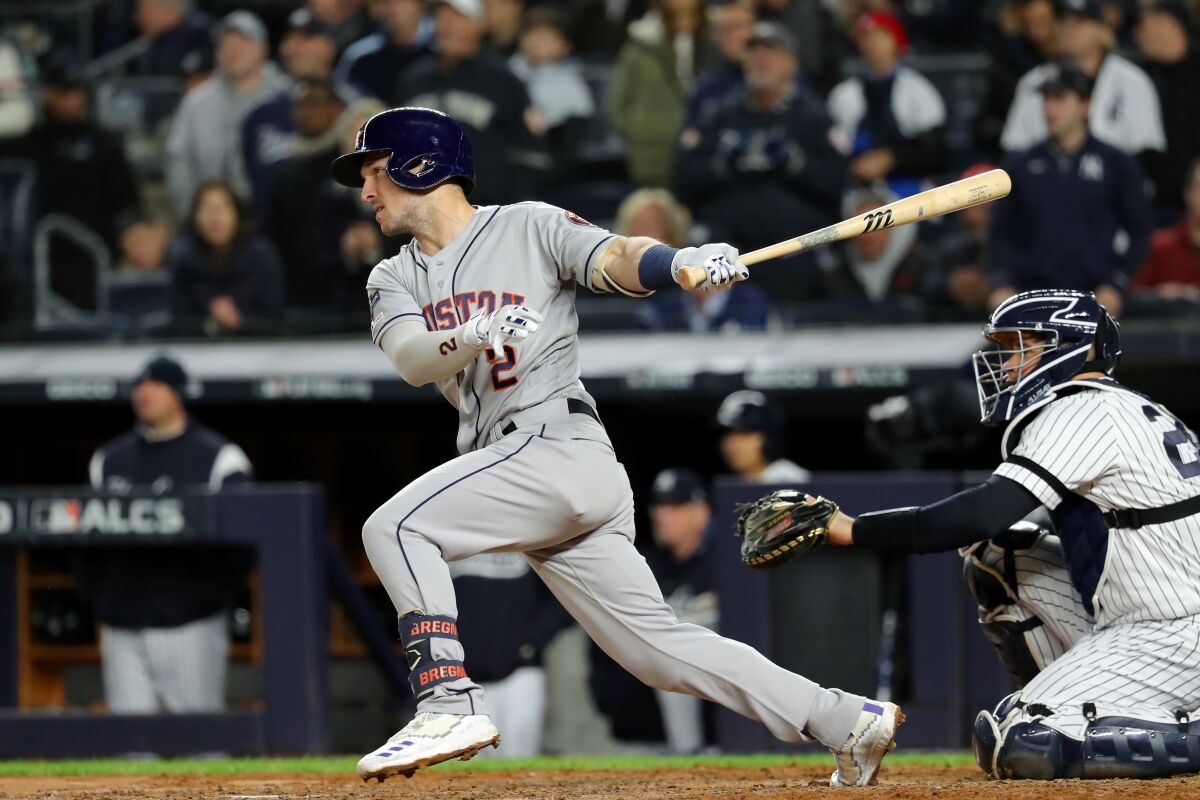 Houston Astros third baseman Alex Bregman singles during Game 5 of the ALCS against the New York Yankees.