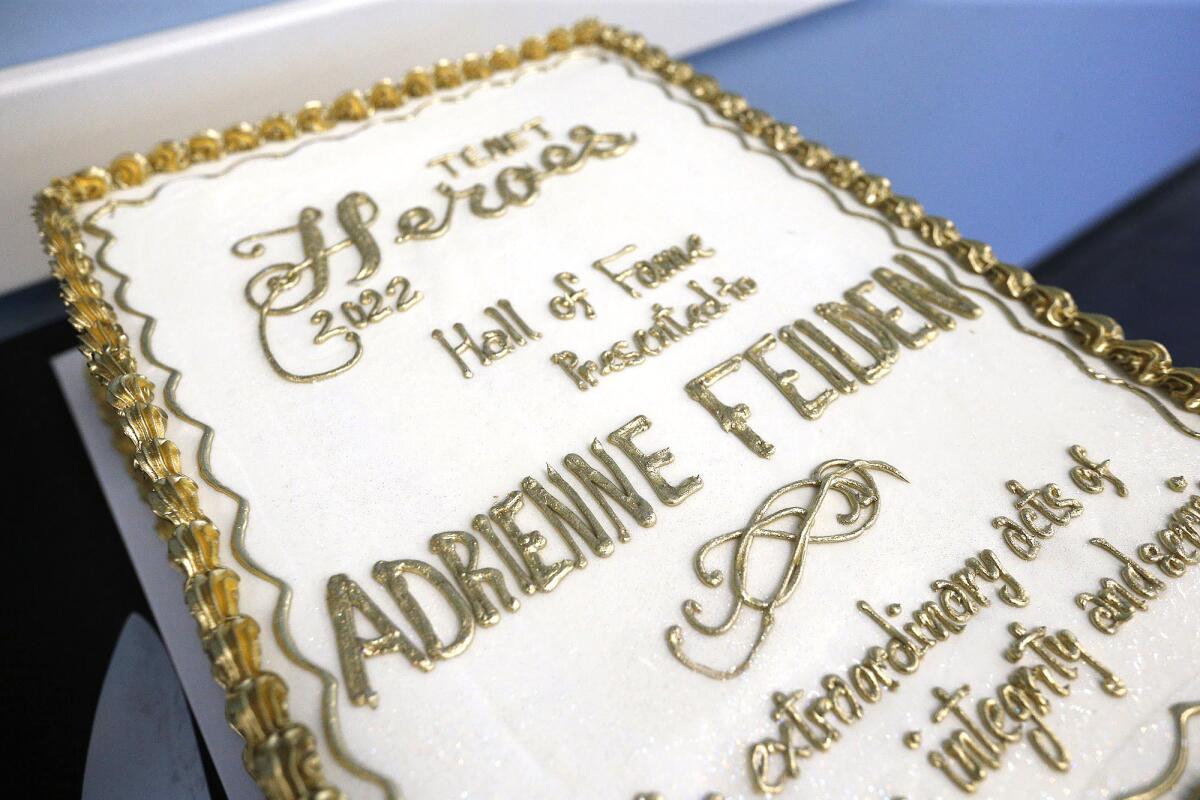 Adrienne Feilden was honored with a cake during her surprise party for her for receiving the 2022 Tenet Health Hero Award.