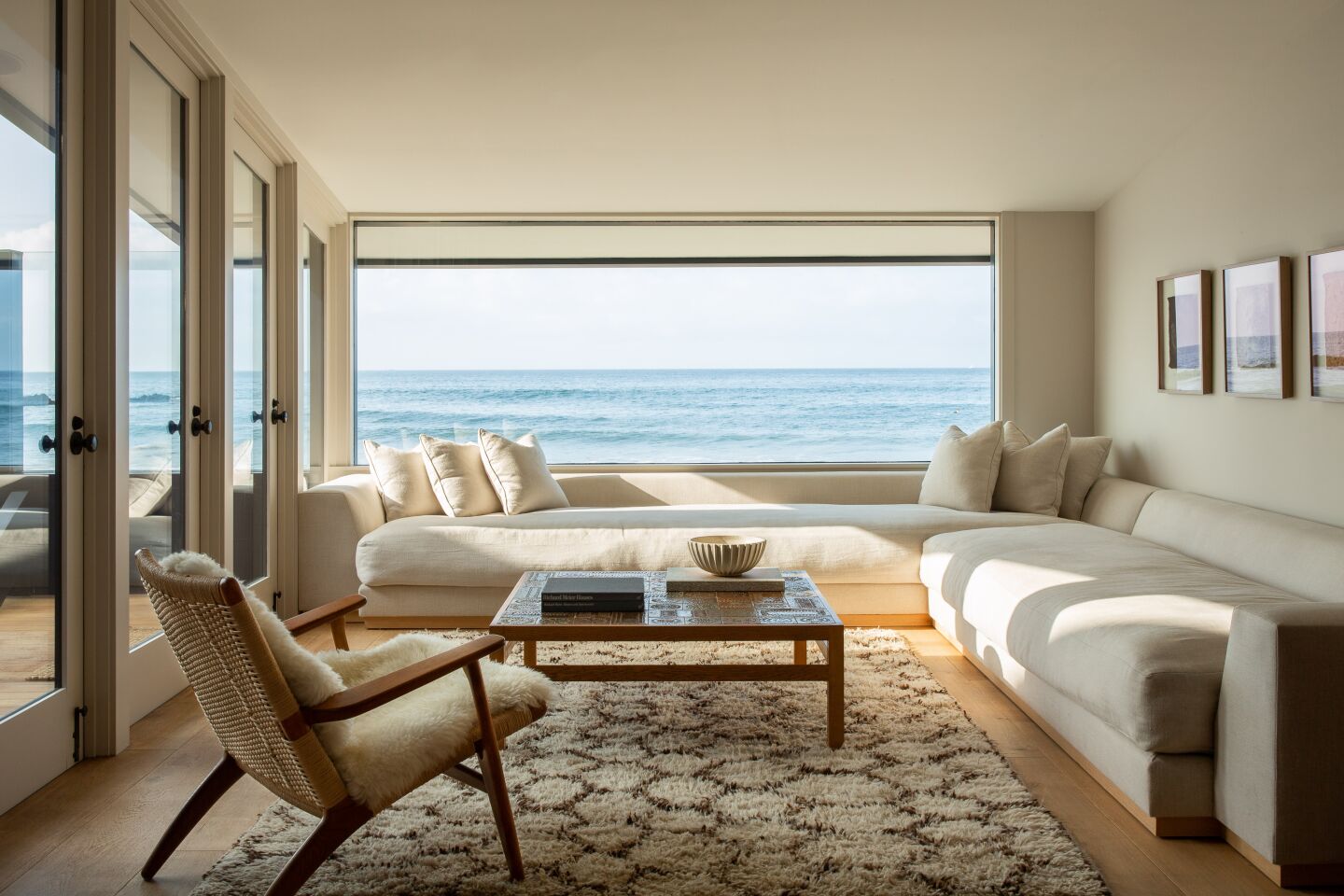 Picture windows take in ocean views.