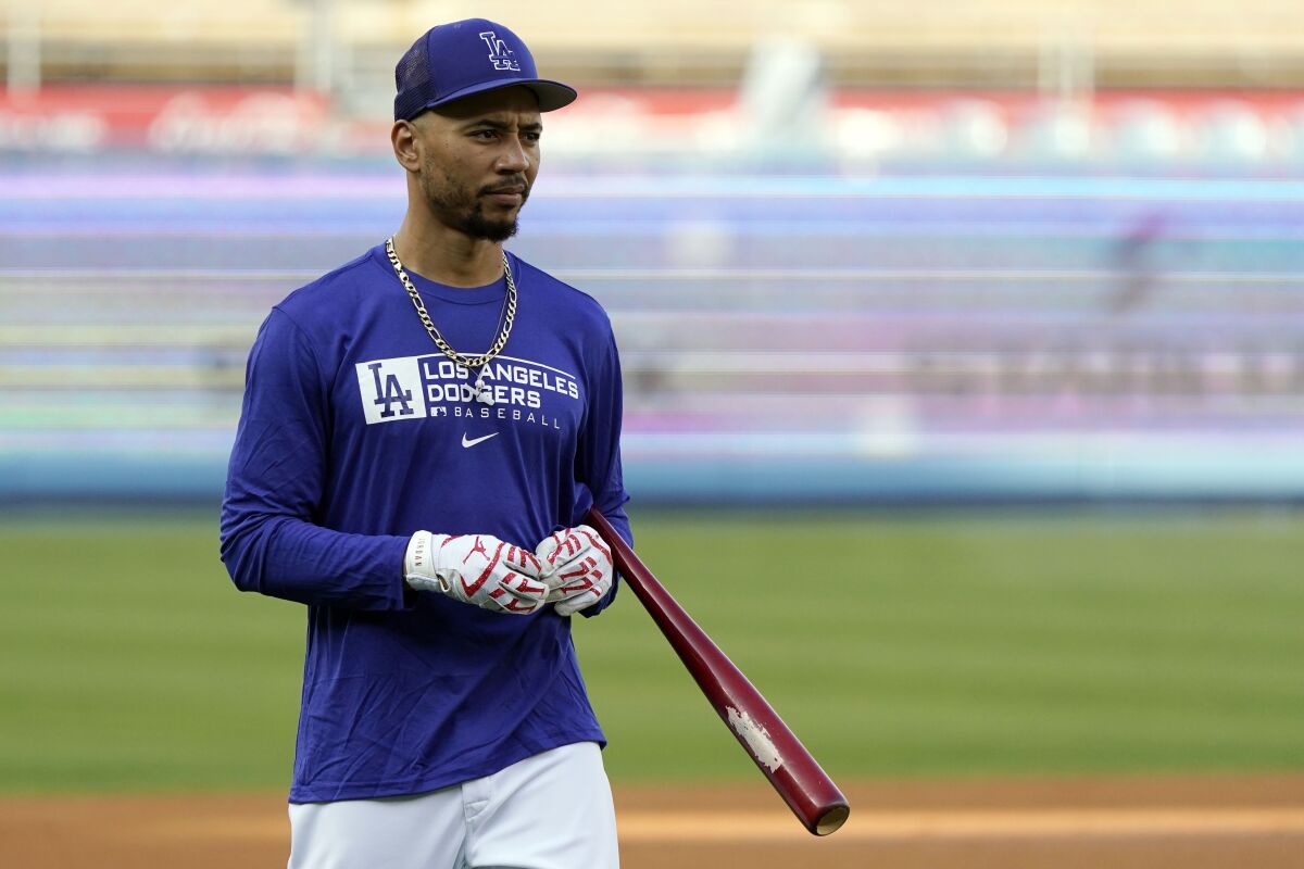Mookie Betts takes part in batting practice at Dodger Stadium on Oct. 7.