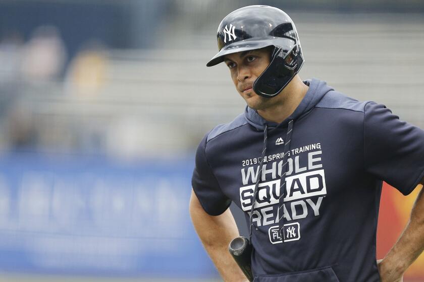 TAMPA, FLORIDA - FEBRUARY 26: Giancarlo Stanton #27 of the New York Yankees looks on prior to the Grapefruit League spring training game against the Philadelphia Phillies at Steinbrenner Field on February 26, 2019 in Tampa, Florida. (Photo by Michael Reaves/Getty Images) ** OUTS - ELSENT, FPG, CM - OUTS * NM, PH, VA if sourced by CT, LA or MoD **