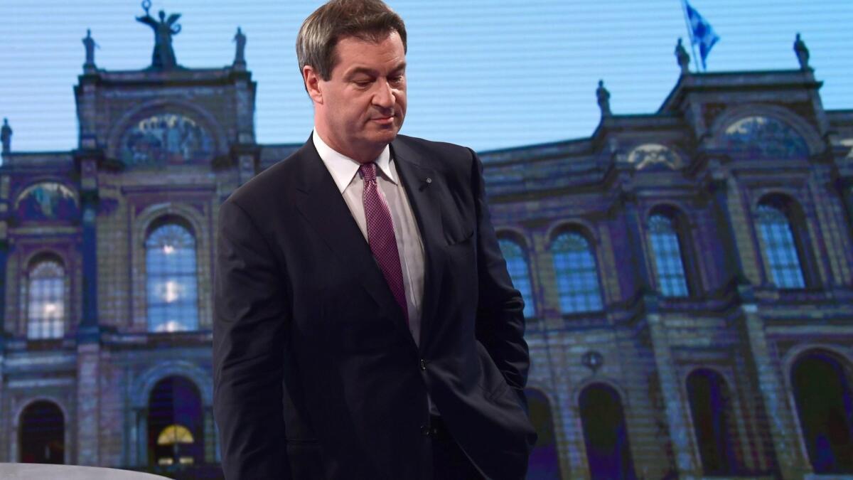 Markus Soeder, Bavaria's governor, arrives to attend a television debate to comment on the results of the regional elections in Bavaria.