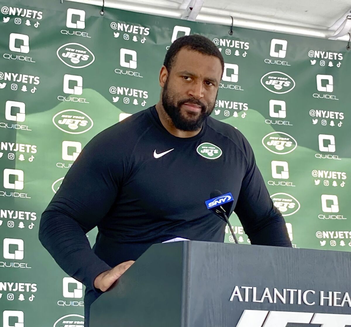 New York Jets offensive tackle Duane Brown speaks to reporters at the NFL football team training facility in Florham Park, N.J., Tuesday, Aug. 16, 2022. Brown signed a two-year contract with the New York Jets to play left tackle -- and at a high level. The offensive lineman, who turns 37 on Aug. 30, is excited to continue his career.(AP Photo/Dennis Waszak Jr.)