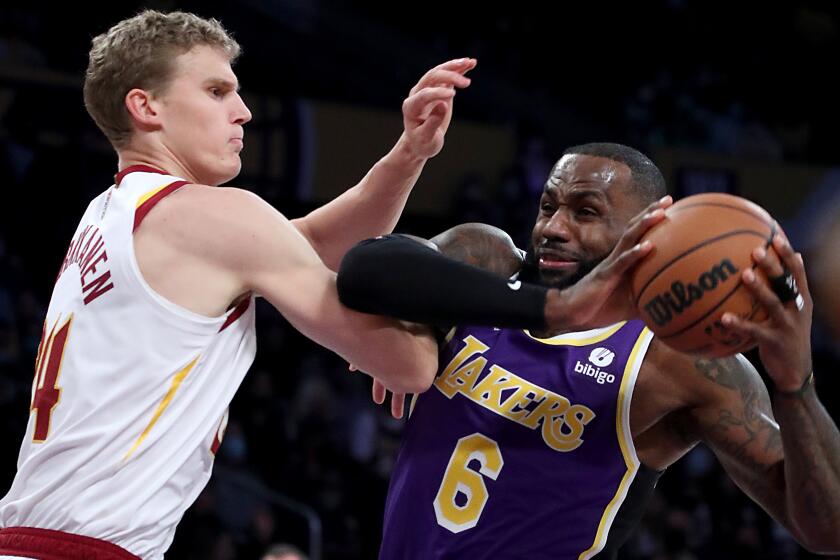 LOS ANGELES, CALIF. - OCT. 29, 2021. Lakers forward LeBron James goes to the basket against Cavaliers.