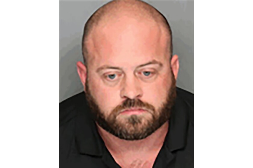Booking mug of San Joaquin County correctional officer Zachary Simmons