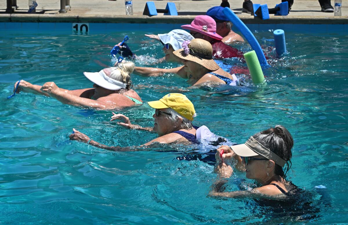  Deep Water Aquafit students swim at the Newport-Mesa Family YMCA.