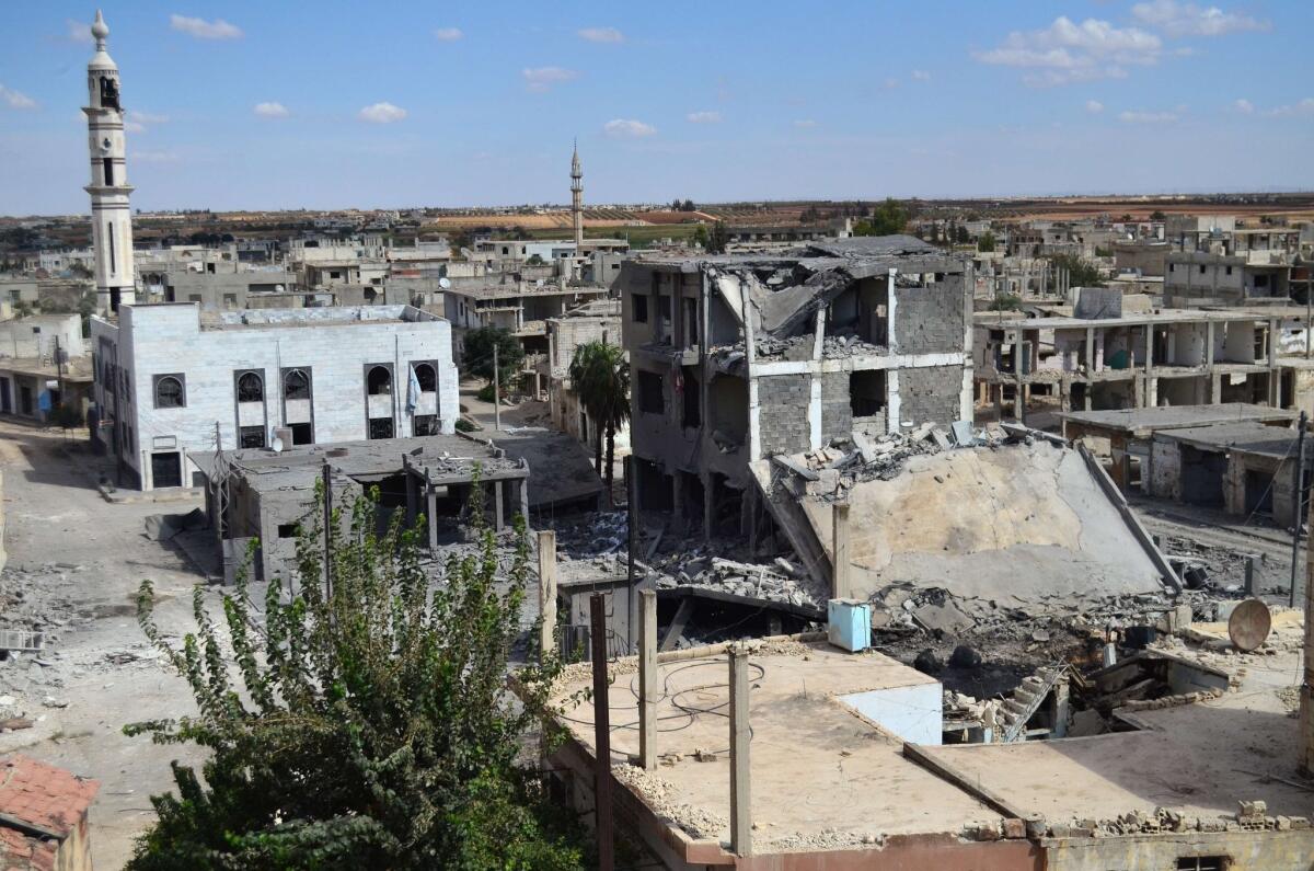 Deserted streets and damaged buildings in the central Syrian town of Talbisseh in Homs province. Russia confirmed Sept. 30 that it had carried out its first airstrike in Syria, near the city of Homs.