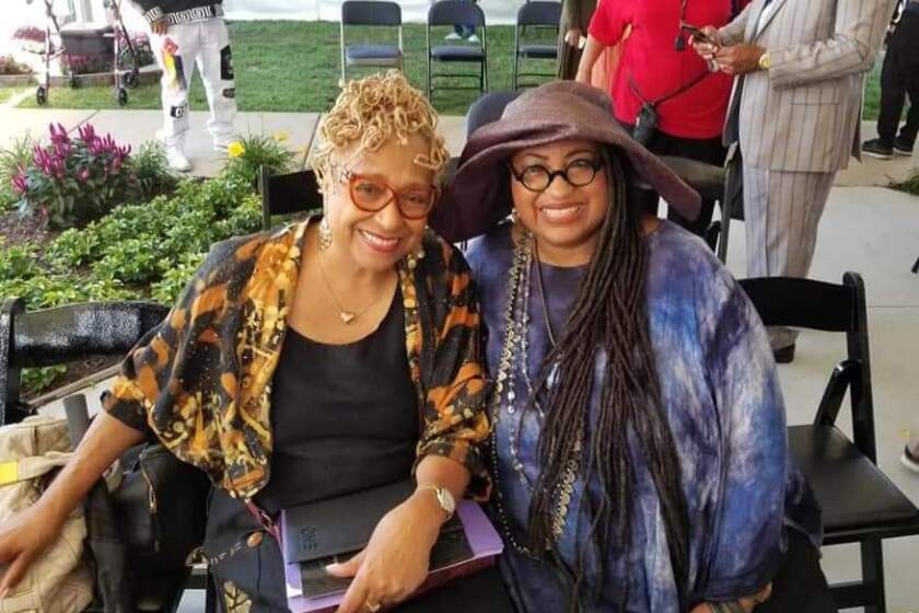 Marsha Music, on the right, sits next to fellow writer and radio show host Brenda Perryman in this photo taken before Perryman fell ill and died from COVID-19 in early April. Music knows more than 30 people who've died in the coronavirus outbreak in her hometown of Detroit and has written tributes on Facebook to many of them.
