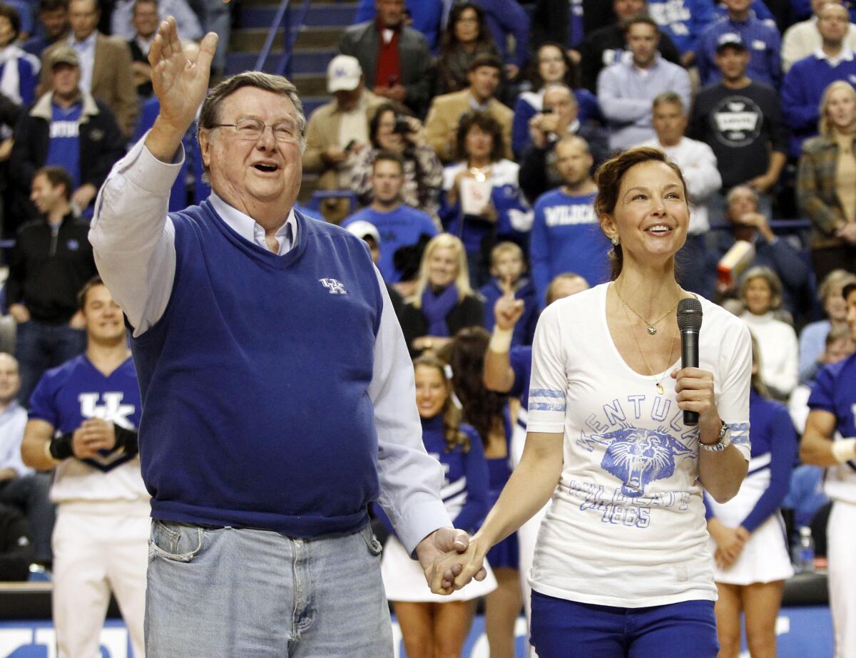 Actress Ashley Judd leads the crowd in singing "Happy Birthday" to former Kentucky coach Joe B. Hall on Nov. 27, 2013.