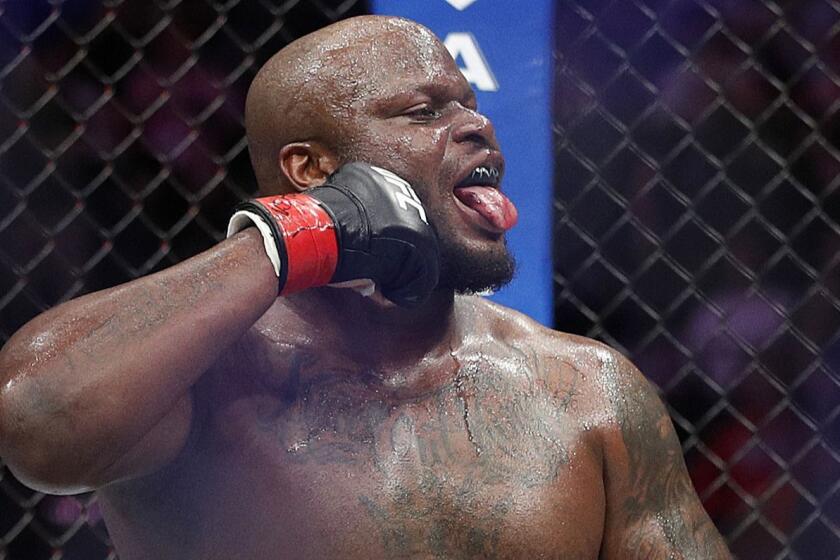 Derrick Lewis celebrates after beating Alexander Volkov during a heavyweight mixed martial arts bout at UFC 229 in Las Vegas, Saturday, Oct. 6, 2018. Lewis won by knockout in the third round. (AP Photo/John Locher)