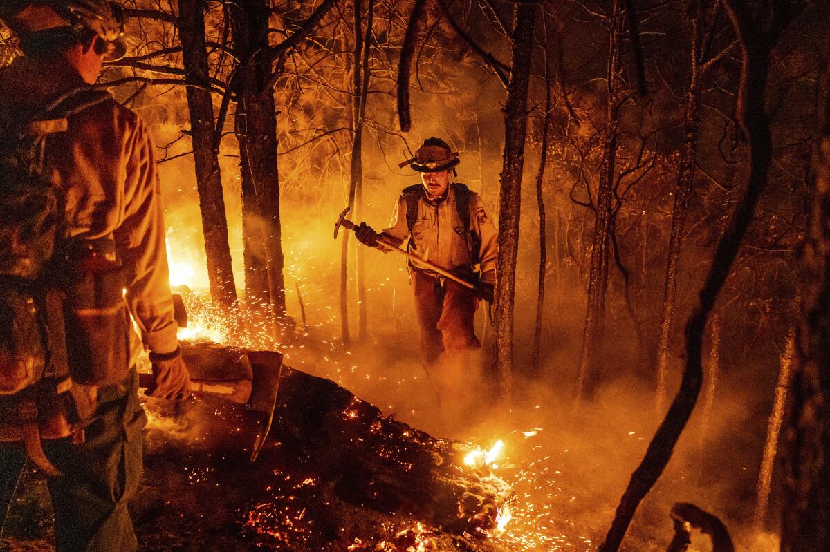 Firefighters battle a blaze.