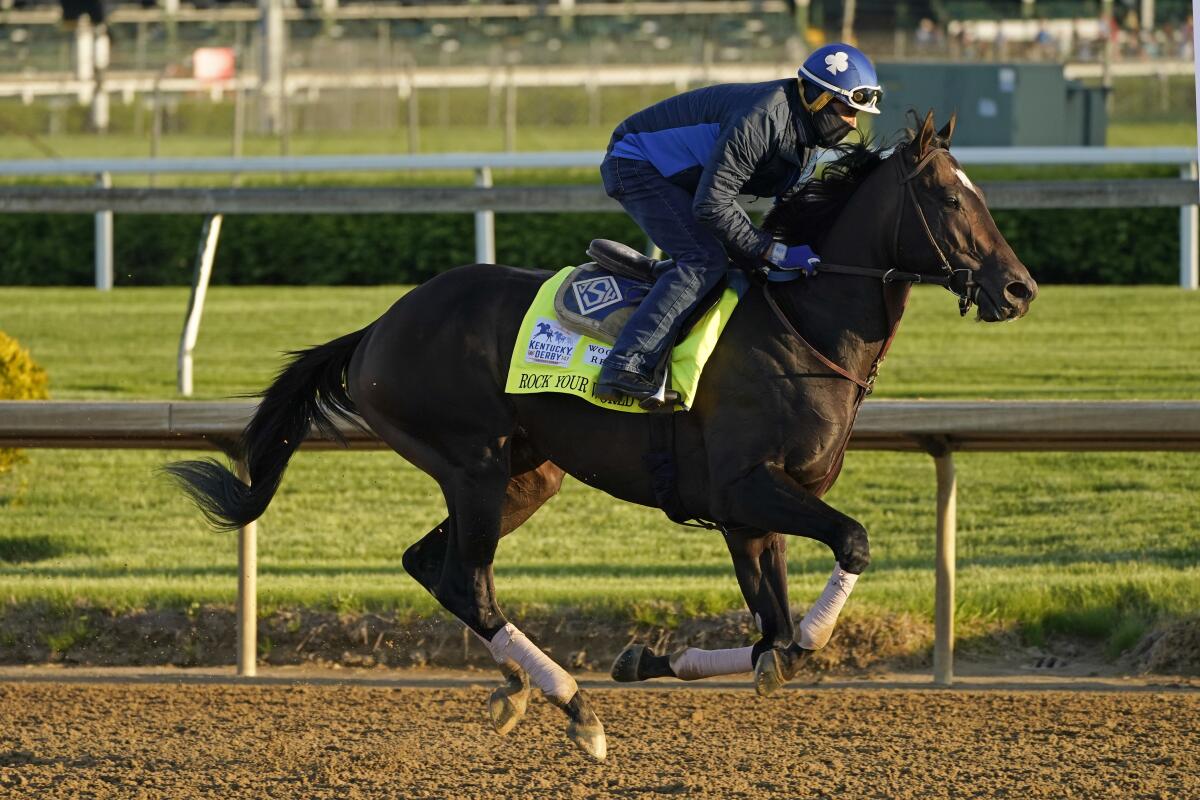 Kentucky Derby hopeful Rock Your World works out at Churchill Downs on Tuesday.
