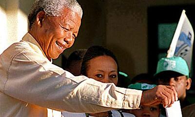 Mandela casts his ballot in 1994, during South Africa's first democratic election.