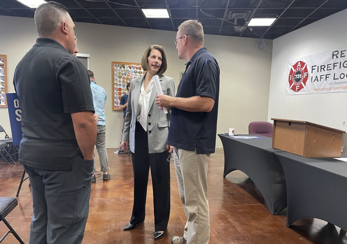 Nevada Sen. Catherine Cortez Mast attends an event announcing the endorsement of the Reno Fire Chief, International Association of Firefighters and Professional Firefighters of Nevada in Reno, Nev. on Wednesday, July 6, 2022. (AP Photo/Gabe Stern)