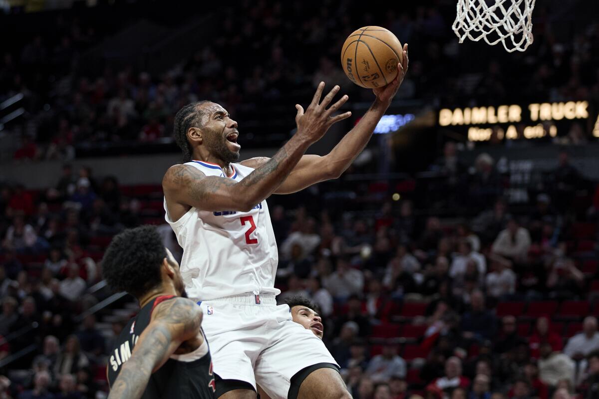 Kawhi Leonard shoots for the basket.