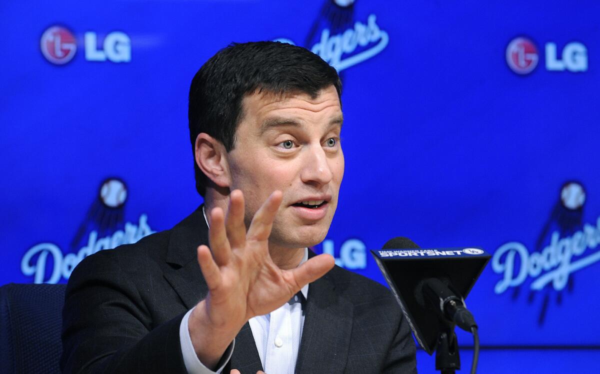 Andrew Friedman, the Dodgers' president of baseball operations, answers questions during a news conference on Oct. 17.