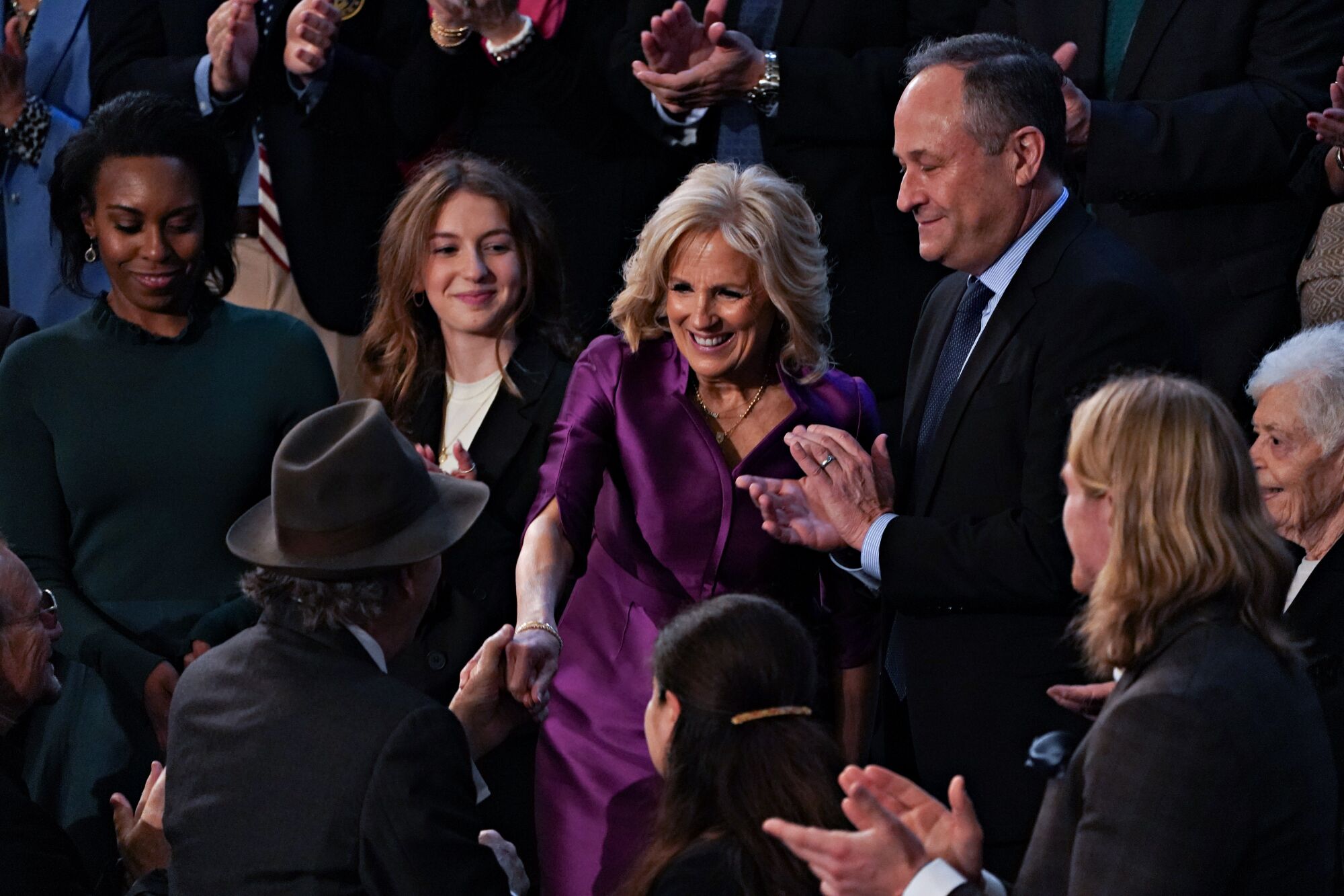 US First Lady Jill Biden, center, arrives to the State of the Union address.