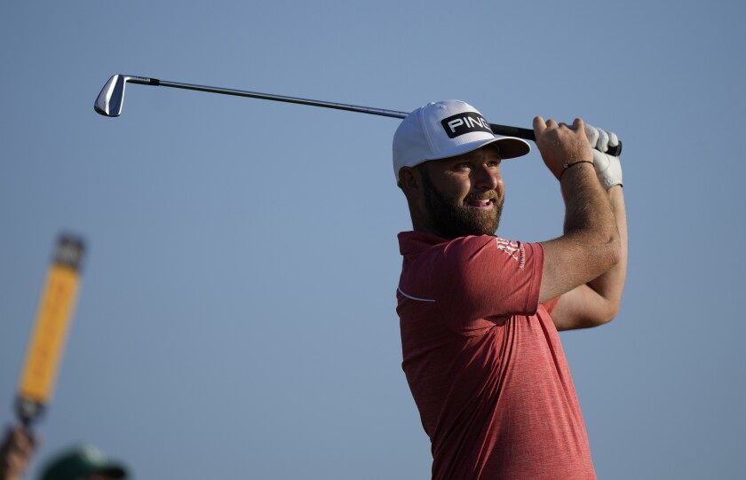England's Andy Sullivan plays his tee shot on the 3rd hole during the first round British Open Golf Championship at Royal St George's golf course Sandwich, England, Thursday, July 15, 2021. (AP Photo/Alastair Grant)